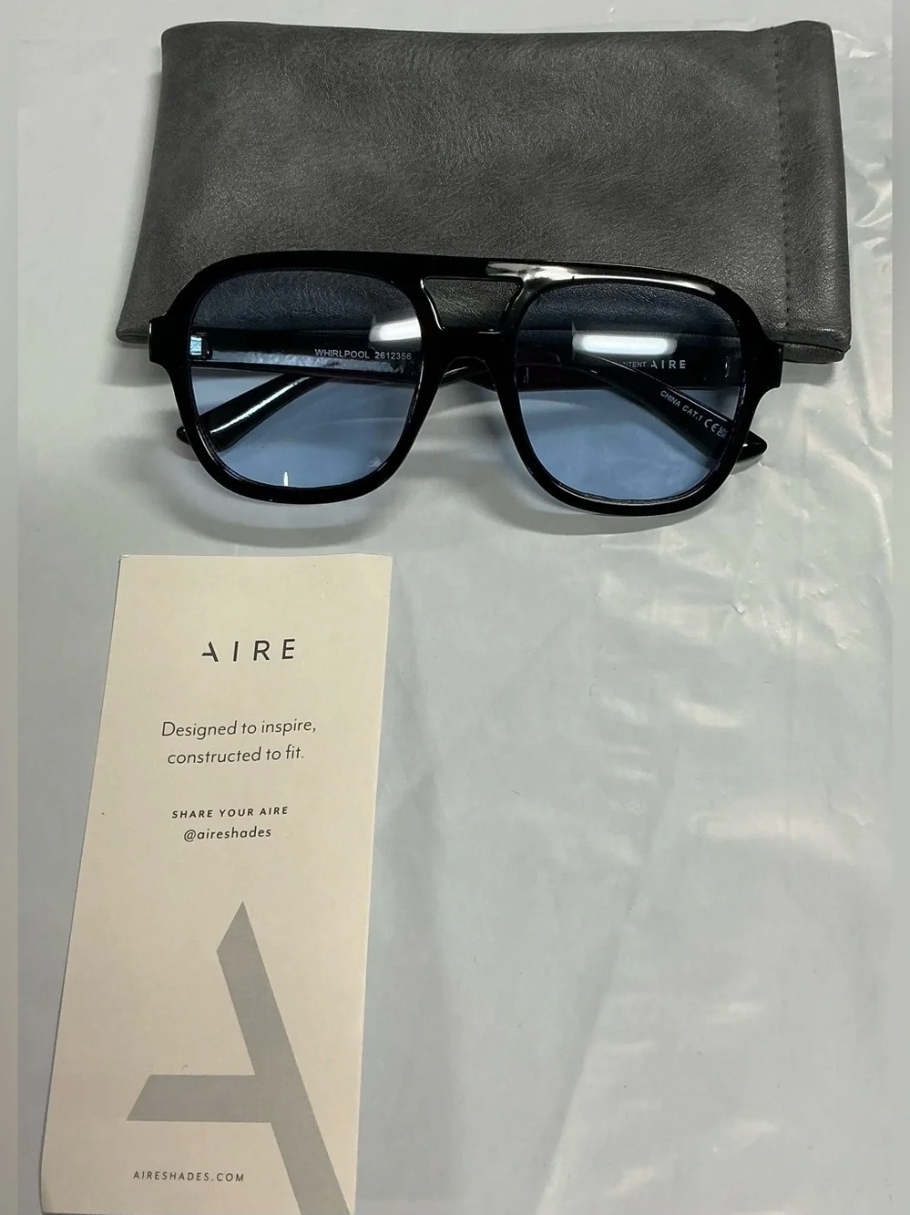 Aire Black Sunglasses with Light Blue Lenses - PR26-17